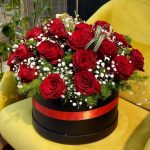 Round Box of Red Rose’s with Green Leaves